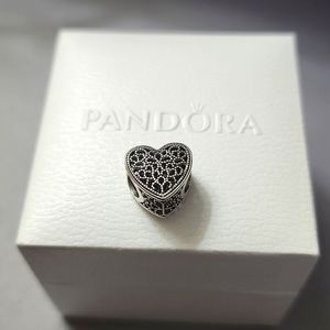 Pandora filigree heart charm